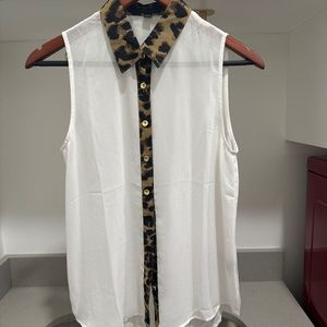 Sleeveless, sheer top with animal print detail